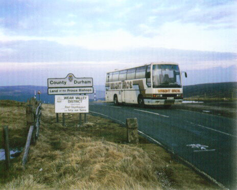 Photo: Wright Bros bus at County Durham border.